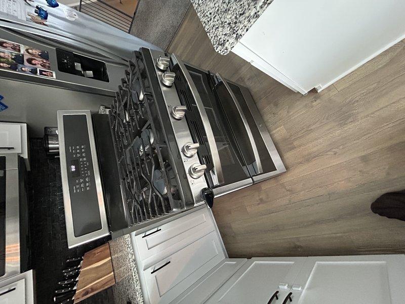 Responded to a customer complaint of gas odor when operating the lower oven. Performed comprehensive leak detection along all gas connections to the appliance, finding no evidence of gas leaks. Upon testing the lower oven during operation, detected no gas odor, though customer noted a slight whiff. Determined smell was likely normal combustion during initial ignition rather than a leak. Advised customer that no immediate concerns were found but recommended contacting an appliance specialist if they wanted further investigation of the oven's internal components.