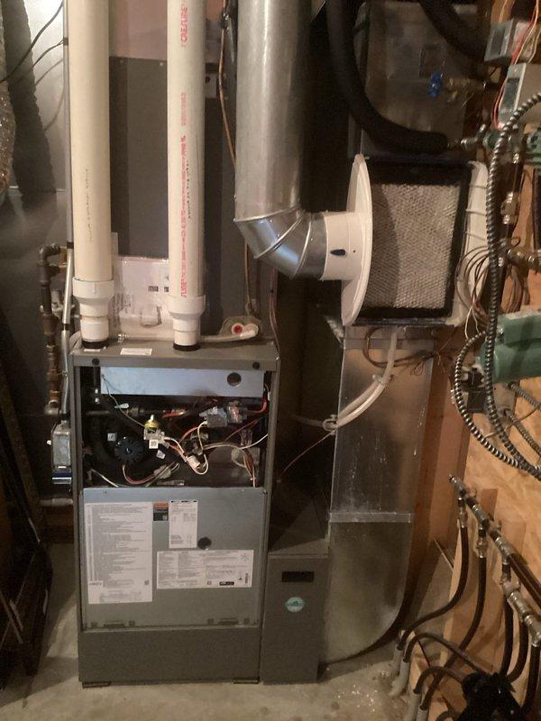 Completed scheduled Family Rewards maintenance service including furnace tune-up, humidifier pad replacement (using customer-provided pad), and air exchanger cleaning and inspection. All systems thoroughly examined with no issues identified. All components functioning properly and left in good working condition.