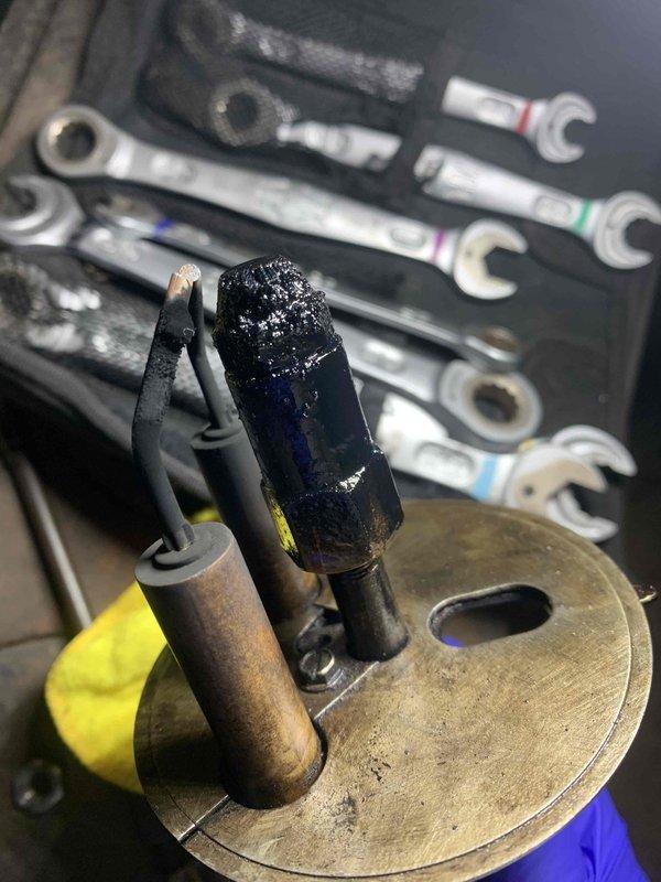 Performed comprehensive diagnosis on malfunctioning oil furnace. Inspected and serviced key components including electrodes, nozzle, transformer, circuit board, and heat exchanger. Identified significant carbon buildup and corrosion on combustion components. Cleaned heat exchanger, bled fuel oil line from tank, and cycled system to verify proper operation. Furnace now functioning with normal operation parameters and correct combustion.