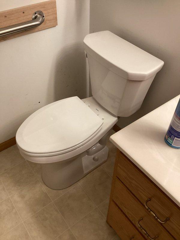 Removed and replaced toilet with severe leak at base due to broken wax seal and loose mounting. Inspection revealed significant rust and corrosion around flange area. Also replaced internal components in master bathroom toilet to restore proper function.