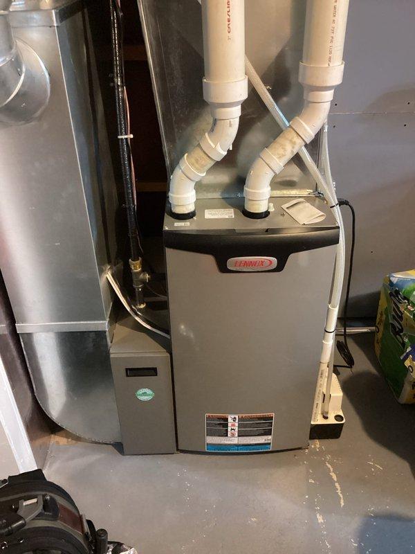 Performed scheduled maintenance on 2-year-old Lennix furnace system. Conducted thorough tune-up including electrical inspection with digital clamp meter. System is operating efficiently with clean combustion and no safety concerns identified.