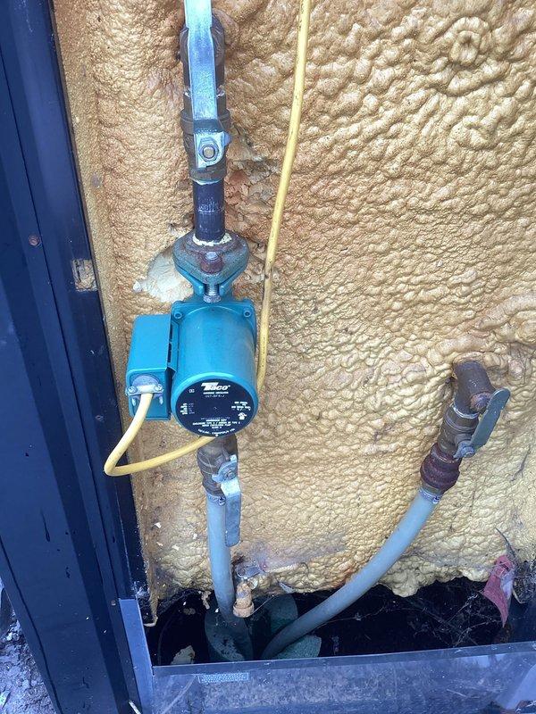 Responded to no-heat service call for wood boiler system. Diagnosed broken impeller on existing Taco 009 circulator pump. Determined pump was oversized for application, replaced with smaller Taco 007 model to better match system requirements. Refilled boiler and verified proper operation.