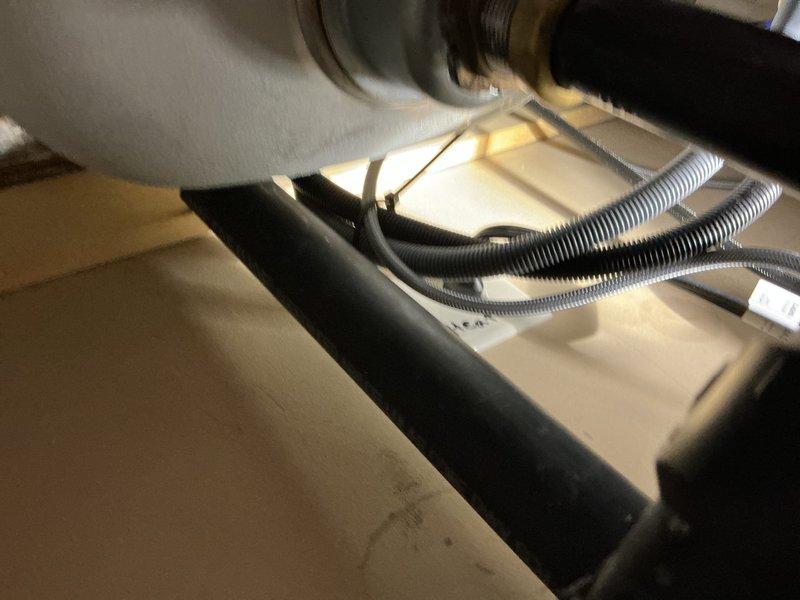 Identified and resolved kitchen sewer odor issue by discovering a dry P-trap. Cut off the deteriorated P-trap assembly and installed new PVC drain configuration with proper water seal to eliminate sewer gas infiltration.