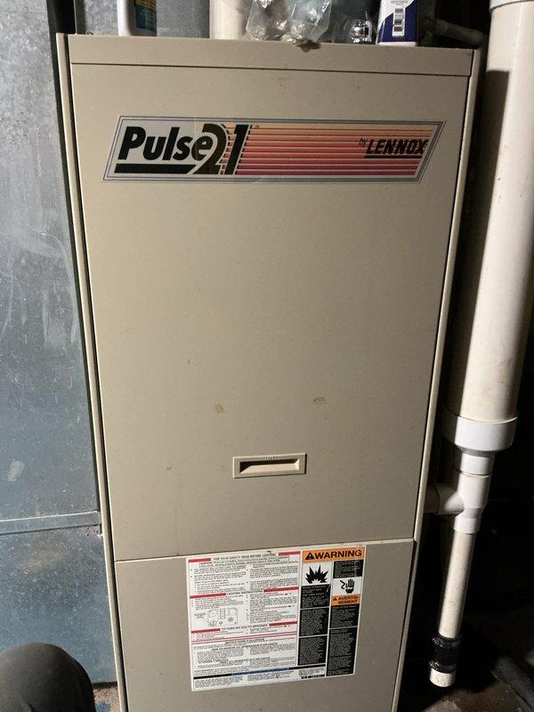 Diagnosed and repaired a Lennox Pulse furnace producing loud noises caused by a stuck float switch on the condensate pump. Released the float switch mechanism, restoring proper movement and resolving the continuous running issue. Condensate pump now functioning correctly with normal operation verified.