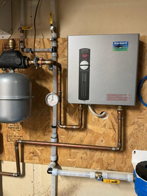 Re-piped customer's water lines to ensure all water from the well passes through the sediment filtration system as originally intended. This included rerouting the kitchen and exterior faucet supply lines through the existing filter, correcting the bypass issue that was previously allowing unfiltered water to these fixtures. Installation now configured properly with all domestic water properly filtered per customer request.