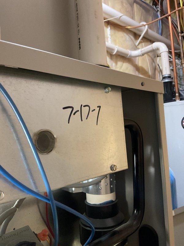 Diagnosed 2007 natural gas furnace with complete system failure after customer reported burning smell. Investigation revealed seized blower motor, which explains both the burning odor and system shutdown. Ordered replacement blower motor specific to the Nordang unit. Verified thermostat was operational but unable to engage heating cycle due to failed motor component.