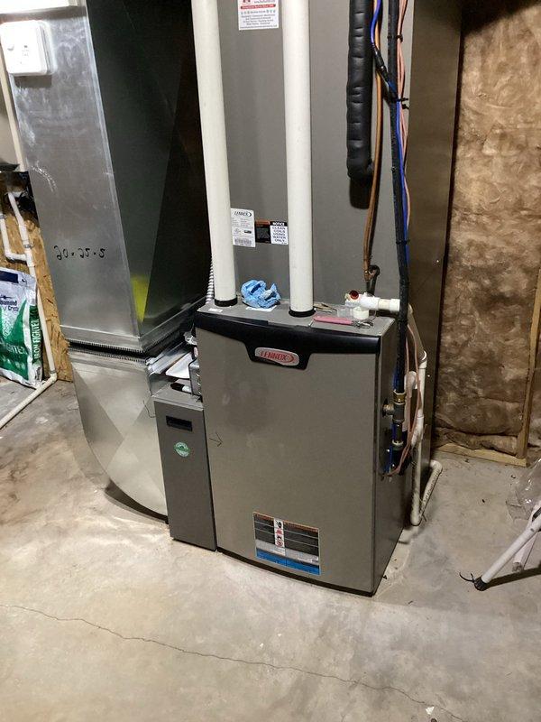 Diagnosed homeowner's no-heat complaint and found a non-functioning smart thermostat despite proper power supply to the unit. Determined the thermostat control board was failing and installed a new S40 thermostat. System is now operating properly with both zones functioning as designed on the 2016 Lennox natural gas furnace.
