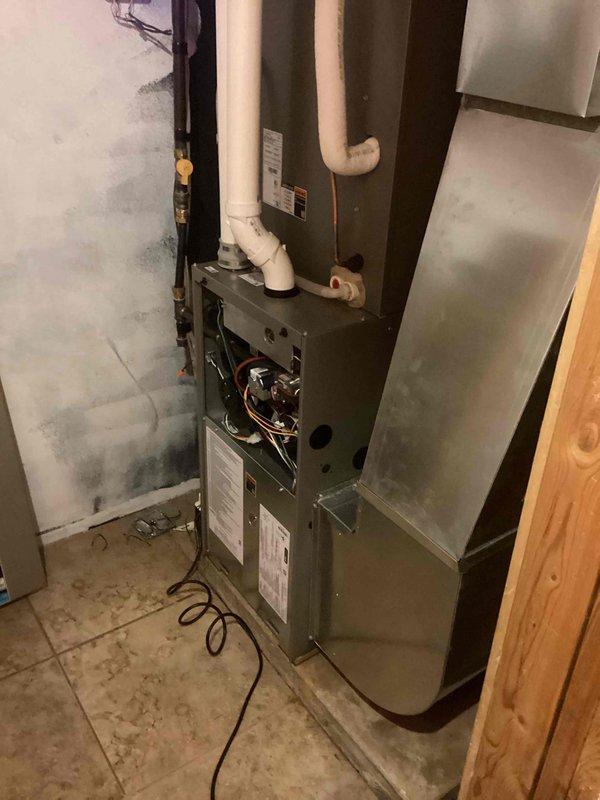 Completed routine tune-up service on two furnaces. The newer main furnace displayed no operational issues during inspection. The older furnace located in the crawlspace exhibited pressure switch and high limit fault codes; noted absence of discharge air temperature sensor which may contribute to limit codes. Replaced air filter and verified unit did not overheat during extended high-fire testing. Provided recommendations for pressure switch and high limit replacement, which customer elected to defer.