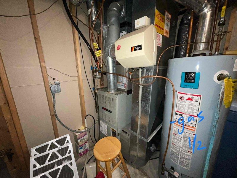 Responded to service call regarding 30-year-old gas water heater not producing hot water with maxed-out temperature setting and a slow leak from the pressure relief valve. Upon inspection, confirmed unit failure and provided replacement options. Also noted inoperative water softener system that was not connected to power.