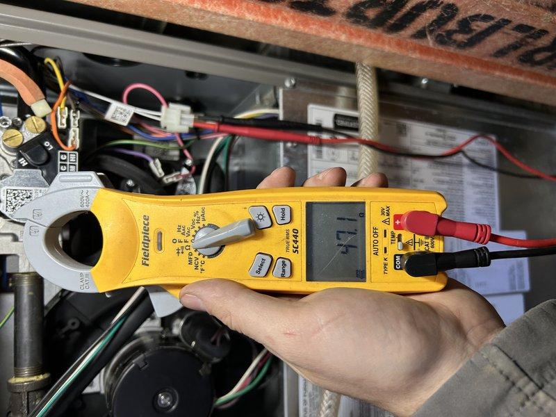 Performed standard furnace maintenance on two units (4 and 11 years old). First unit was operating properly with clean filter, good electrical components, and normal temperatures. Second unit required air filter replacement as it had been pulled into blower compartment. Discovered broken condensate line behind Geo unit in garage that requires repair; homeowner may attempt self-repair or request professional installation of new line from furnace to bathroom. Removed debris from fresh air intake on concentric vent and completed routine inspection of heat exchanger.