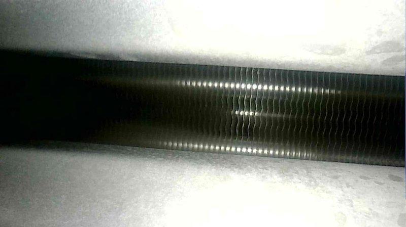 Completed routine HVAC maintenance tune-up on 8-year-old furnace system. Inspected heat exchanger coils and verified all components working properly. System is functioning normally with no issues identified.