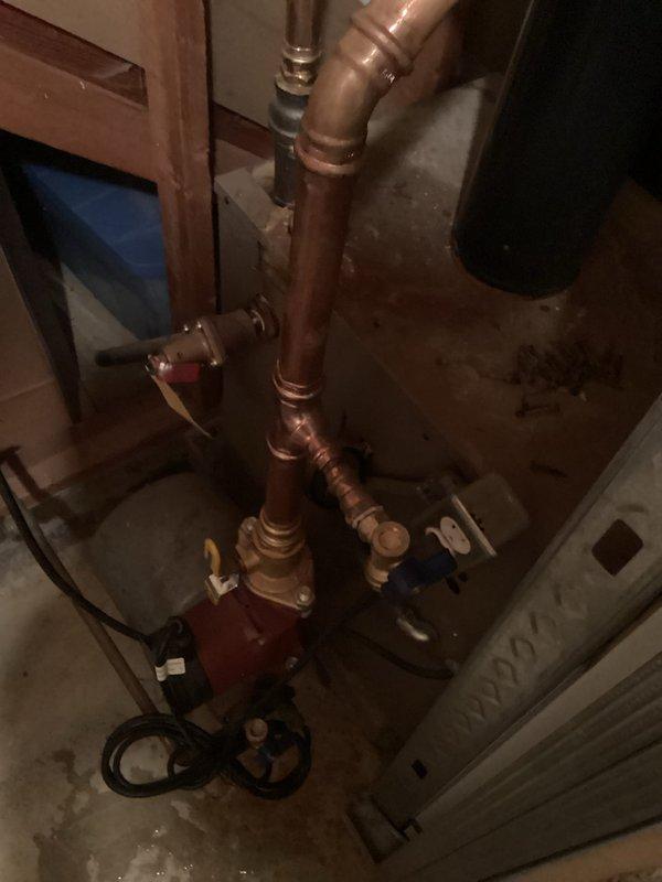 Completed annual tune-up on 50-year-old boiler system as part of maintenance agreement. Inspected all components with system functioning properly, though deteriorating burner gasket was temporarily sealed with high-temperature silicone. Customer advised that while system should operate through current heating season, boiler replacement is recommended next year. One mini-split service deferred until spring due to snow accumulation; second unit to be serviced at that time.