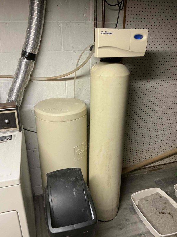 Diagnosed thermostat malfunction causing no heat condition. Replaced faulty thermostat with new Honeywell Home ProSeries unit, cleaned burners to restore proper combustion, and replenished low water level in boiler system to restore proper operation.