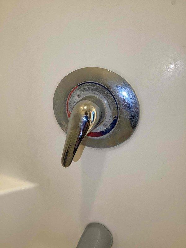 Responded to no heat complaint but identified actual issue was isolated to hot water supply in upstairs bathtub, not boiler-related. Verified water heater operational with both elements functioning properly and confirmed hot water available at other fixtures. Issue diagnosed as plumbing fixture problem; arranged for qualified plumber to address bathtub fixture repair.