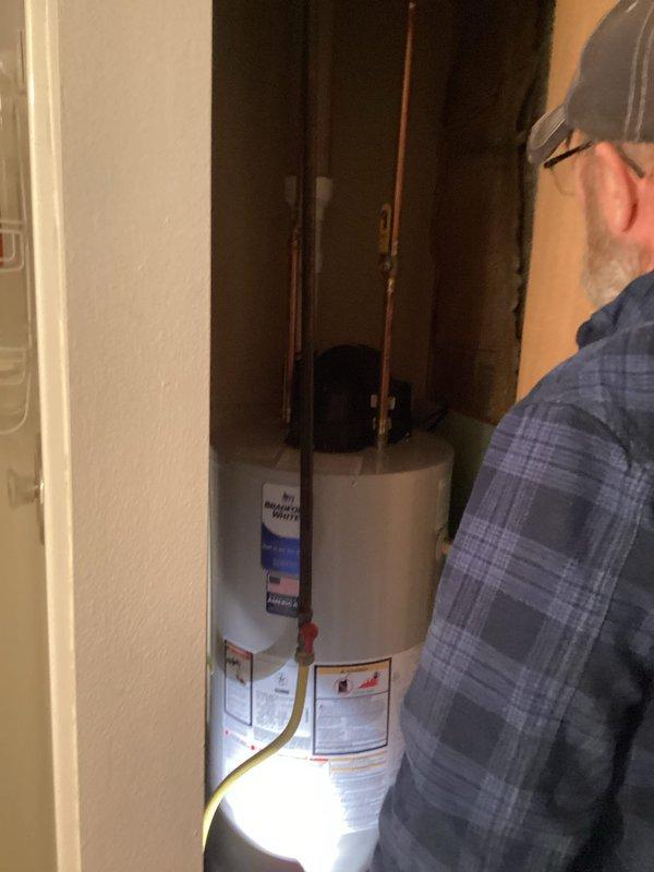 Successfully installed new 40-gallon LP power vent water heater in utility closet. Connected copper water lines and gas supply, ensuring proper venting. System tested and confirmed operational with no leaks.