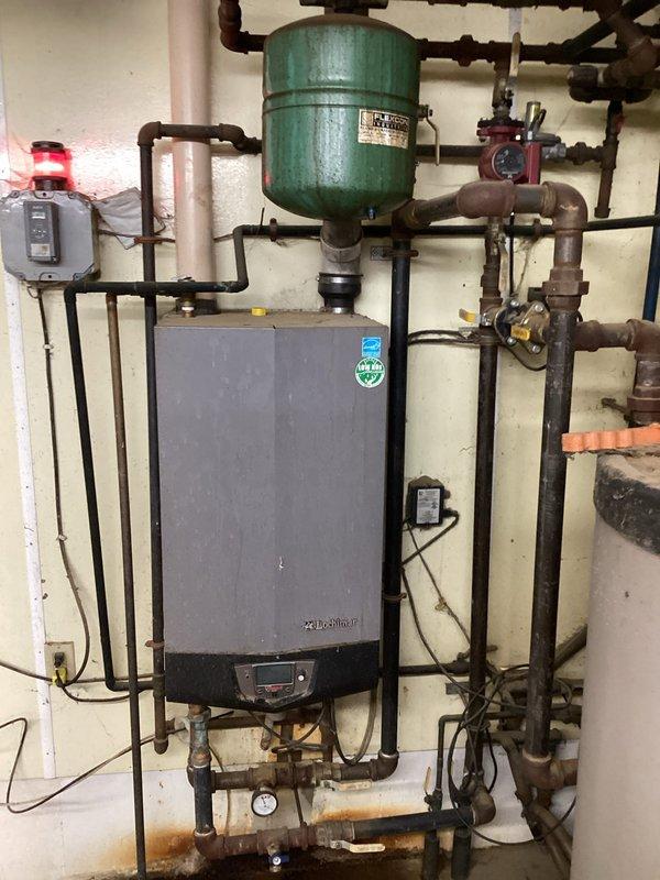 Responded to return service call to replace a faulty pressure switch on the boiler system in back parlor area. Successfully installed new pressure switch and verified proper boiler operation with a comprehensive system check. Equipment is now functioning as designed with no operational issues observed.