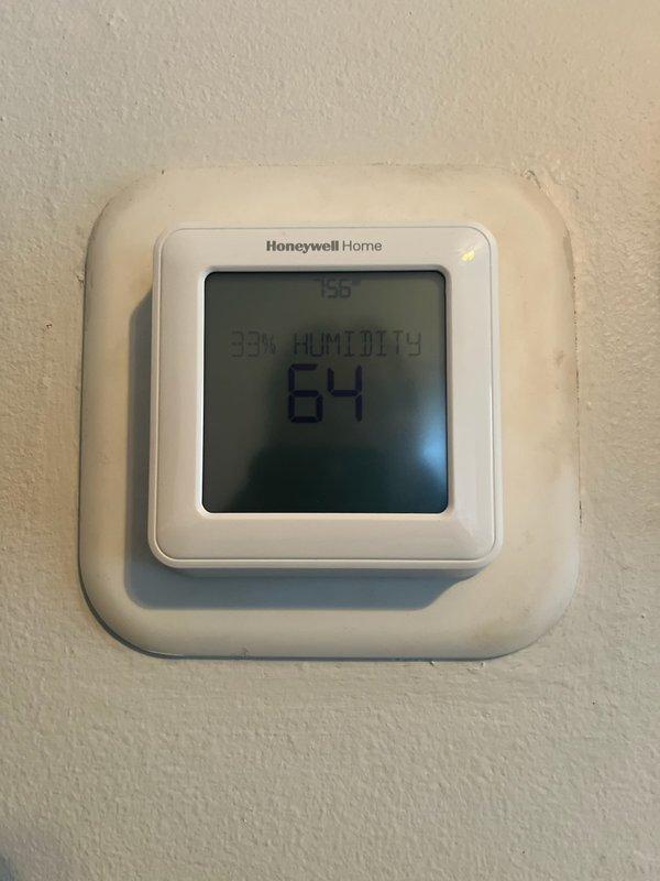 Responded to a call regarding a thermostat stuck in humidifier mode with no heat. Found thermostat functioning properly but diagnosed a failing flame sensor and dirty blower wheel. Replaced the flame sensor, removed and replaced dirty filter, and cleaned blower wheel, restoring full system operation.