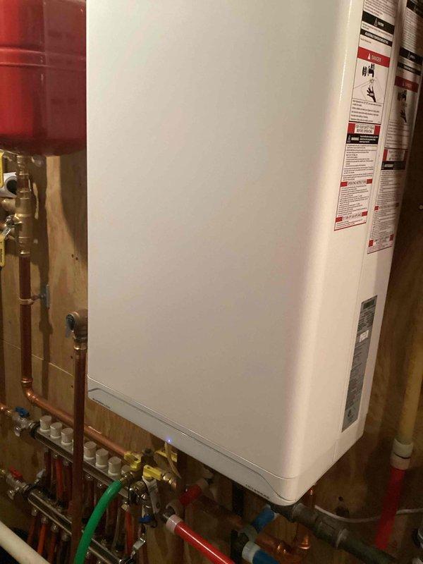 Replaced corroded and leaking IBC condensate trap on customer's boiler system. After installation, filled the new trap with water and verified proper system operation through testing cycles. System is now functioning normally with no leaks observed.