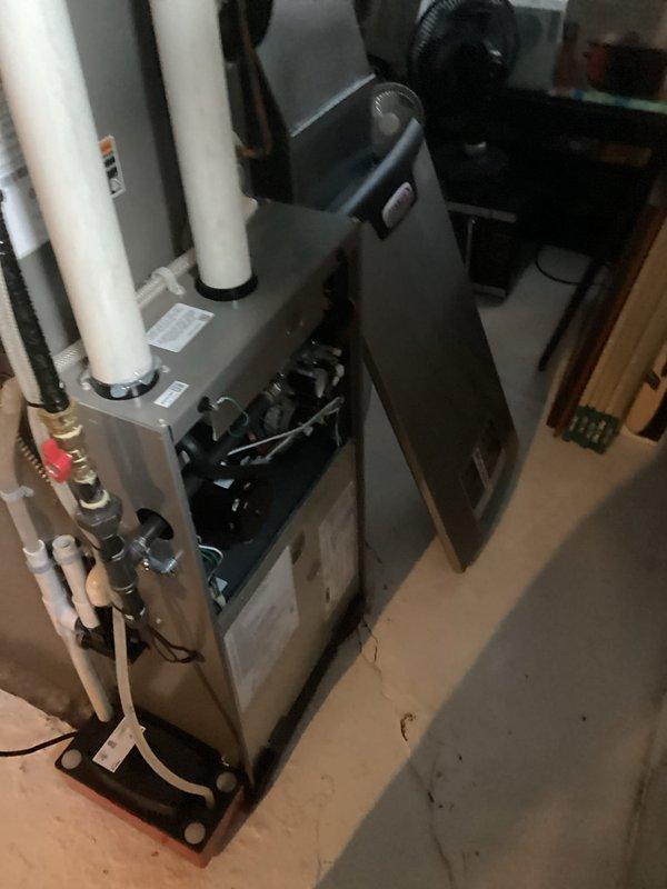 Diagnosed no heat complaint on 2-year-old furnace with continuous operation and insufficient airflow. Discovered filter severely clogged with white particulate matter from ultrasonic humidifier use. Removed obstructed filter, performed system reset, and test ran furnace to verify proper operation and restored heating functionality.