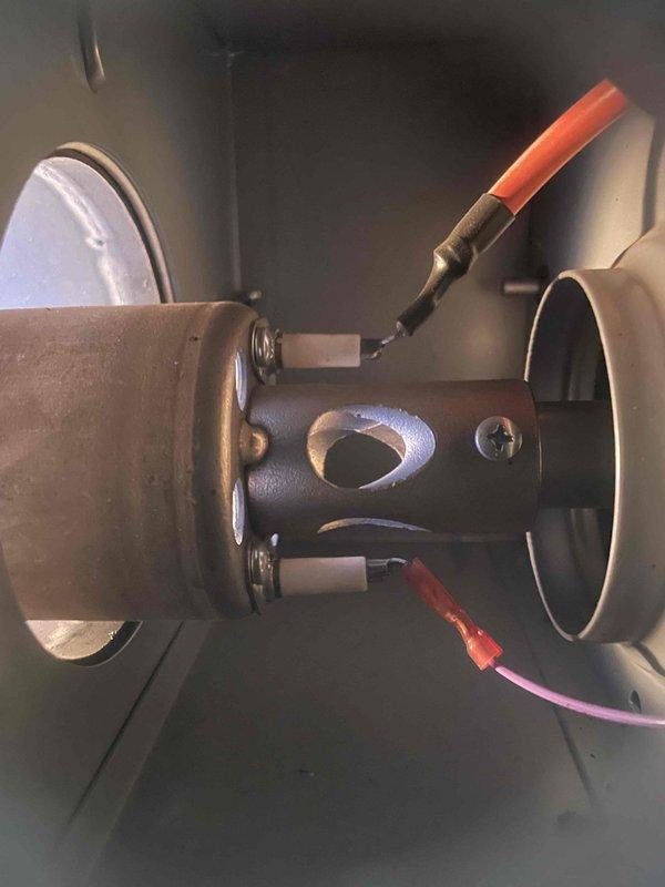 Responded to no-heat call for shop heater. Diagnostic inspection revealed damaged neutral wire where incoming power connector had been rubbing against inducer wheel, preventing unit from receiving power. Installed 14-gauge wire to replace damaged section, restored power to unit. System now operating correctly with proper heating function.