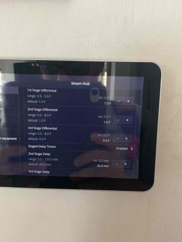 Completed warranty repair on an E30 smart hub system. Installed new hub, verified proper terminal connections to the control board, and confirmed system functionality through interface settings including stage differentials and delay timers.