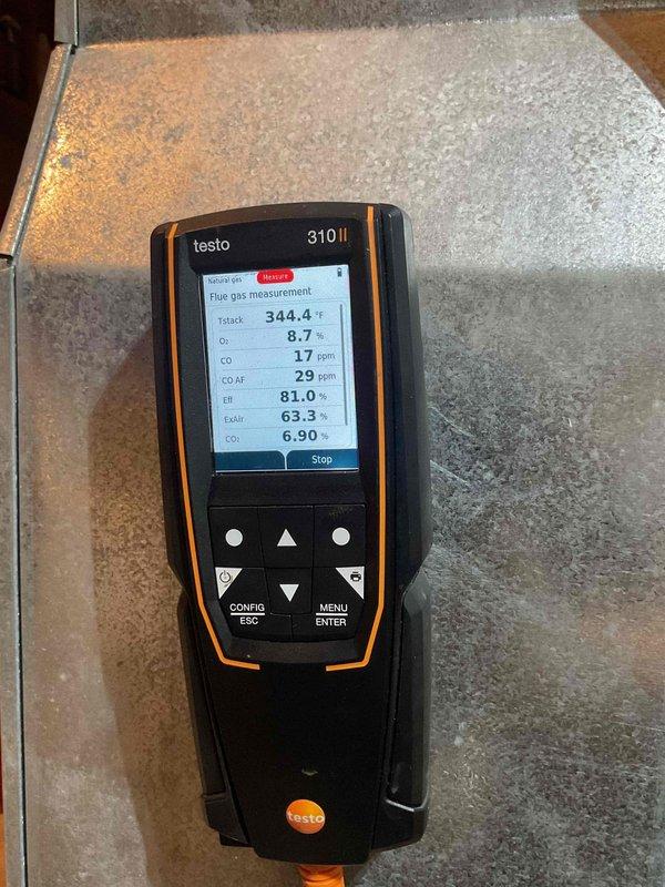 Responded to no heat complaint on aging system (10+ years old) that was short cycling after approximately 5 minutes of operation. Diagnostic testing revealed rust on heat exchanger and combustion analysis with Testo 310 II showed efficiency at 81.0% with 17ppm CO. Replaced dirty filter and advised customer of heat exchanger condition, with customer considering replacement options.