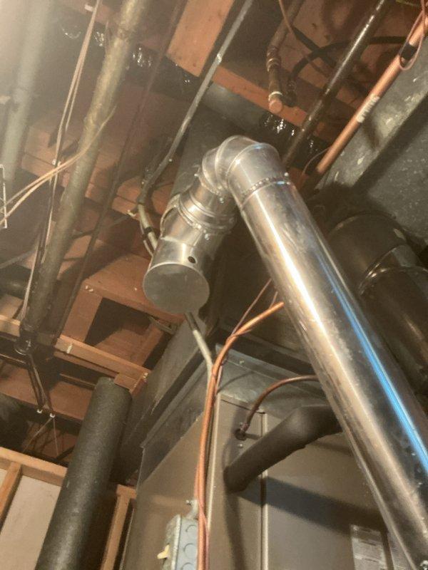 Performed scheduled furnace tune-up on 10-year-old unit. Addressed significant dust accumulation throughout system, particularly on internal components and electrical connections where cobwebs were present. Completed comprehensive maintenance including blower cleaning, circuit board replacement, and ignition system replacement. System functioning properly after service with no operational issues detected.