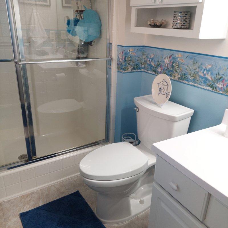 Diagnosed and resolved running toilet issues in master bath and main bath. Replaced American Standard flush valve seals on both toilets to address leakage that was causing floor damage. Adjusted trip lever on main bath toilet for proper operation.