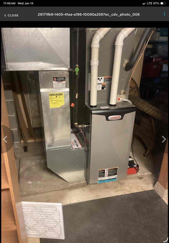 Diagnosed and repaired leak in 20-inch whole house water filter system (VIQUA AWP52B-V). Determined gray Teflon pipe dope used on gasket-to-housing seal was incompatible and causing failure. Removed all existing pipe dope and properly resealed with appropriate silicone-based product to resolve the leak issue.