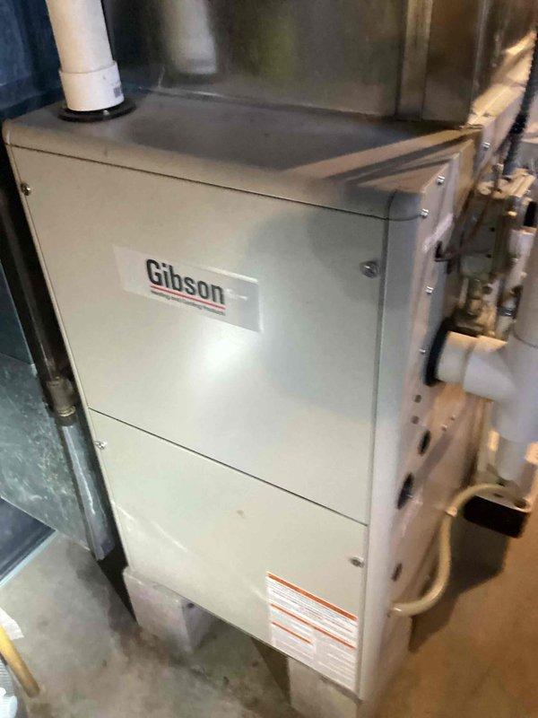 Responded to service call for non-functional water heater. Successfully re-lit 15-year-old Richmond water heater with improper venting configuration (3-inch vent tied into unused 6-inch flue). Advised homeowner on recommended replacement due to age of unit and provided information on future replacement options.