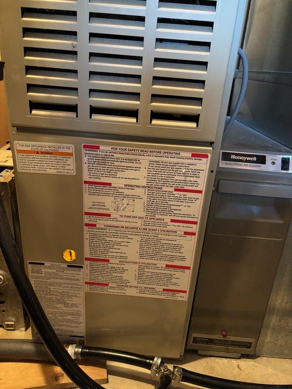 Performed $29 maintenance tune-up on Honeywell HVAC system. Discovered rust in heat exchanger with HSI reaching limit. Replaced flame sensor due to age. Installed paper filter as temporary solution for non-functioning electronic air cleaner, with customer aware that diagnostic and repairs for the air cleaner would require additional service.
