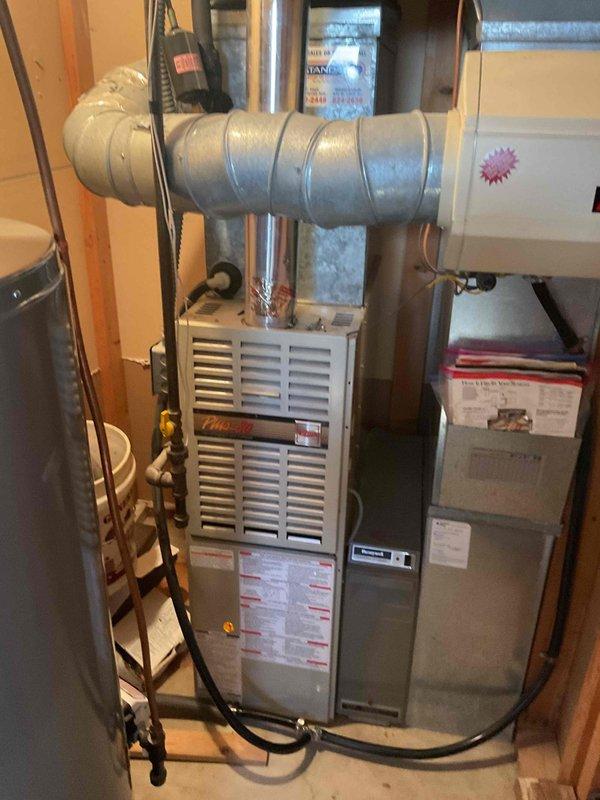 Performed $29 maintenance tune-up on Honeywell HVAC system. Discovered rust in heat exchanger with HSI reaching limit. Replaced flame sensor due to age. Installed paper filter as temporary solution for non-functioning electronic air cleaner, with customer aware that diagnostic and repairs for the air cleaner would require additional service.