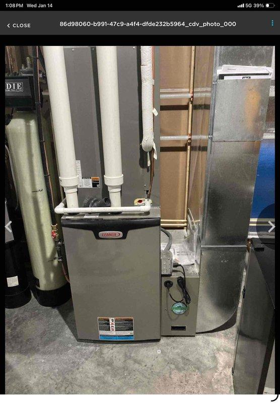 Replaced 18-month-old whole home water filter with new 20-inch standard filter. System inspection confirmed proper installation and functionality of the water treatment equipment adjacent to the home's HVAC system.