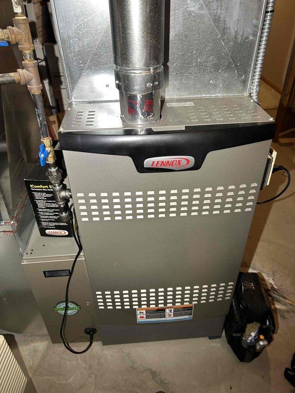 Performed scheduled annual tune-up on Lennox HVAC system (furnace model SL280UH110V60C-05, AC model 14ACX036). Client rescheduled for comprehensive service to include installation of PureAir filter kit Y6608, UV light, and humidifier pad replacement, which will be completed during follow-up visit once parts are acquired.