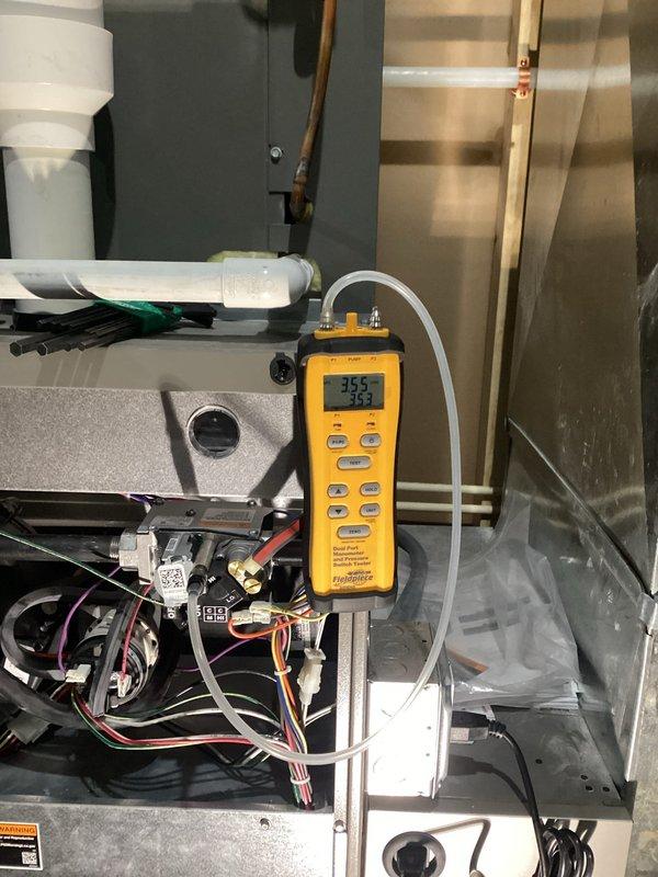 Completed comprehensive furnace tune-up on 5-year-old system. Inspected and verified all components functioning within specifications including clean filter and blower, proper electrical connections, clear condensate lines, and intact heat exchanger. Tested operation with 65-degree temperature rise and confirmed correct gas pressures. Noted service light indicating humidifier cylinder replacement needed; customer requested estimate for this service.