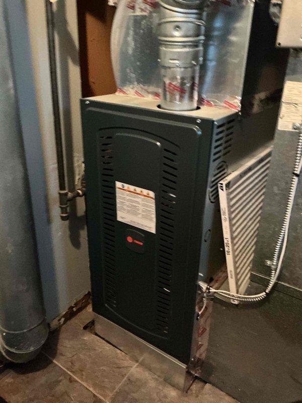 Completed installation of customer-supplied tub shower valve, spout, and shower head in bathroom with mint green tile surround. Work was performed as per previous estimate, utilizing existing access from behind the valve. No warranty provided for customer-supplied materials as per company policy.