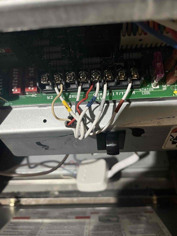 Responded to customer callback regarding missing AC display on previously installed thermostat. Diagnosed issue as missing wire adapter between 4-wire thermostat and 5-wire furnace connection. Installed appropriate wire adapter at the control board and reconfigured thermostat settings, successfully restoring AC functionality on the display.