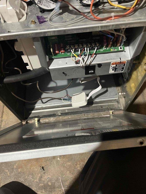 Responded to customer callback regarding missing AC display on previously installed thermostat. Diagnosed issue as missing wire adapter between 4-wire thermostat and 5-wire furnace connection. Installed appropriate wire adapter at the control board and reconfigured thermostat settings, successfully restoring AC functionality on the display.