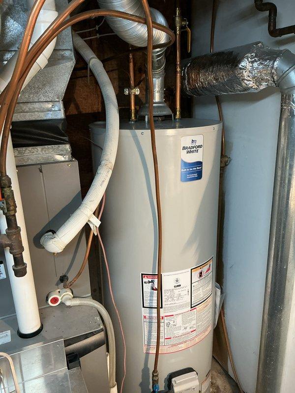 Responded to a water leak issue at a laundry tub sink. Upon inspection, determined the leak originated from loose drain piping connections beneath the tub. Performed necessary tightening of all drain components, successfully resolving the leak.