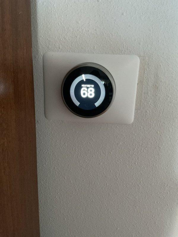 Performed bi-annual inspection on two furnace units. The 3-year-old Trane unit on the original side of the home is functioning properly; recommended leaving closet door open to improve combustion air flow for the atmospheric water heater and 80% furnace. The 21-year-old York unit is running hot with only 87% efficiency; discussed potential replacement options with homeowner due to the age of both the furnace and water heater.