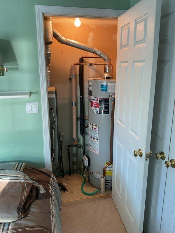 Performed bi-annual inspection on two furnace units. The 3-year-old Trane unit on the original side of the home is functioning properly; recommended leaving closet door open to improve combustion air flow for the atmospheric water heater and 80% furnace. The 21-year-old York unit is running hot with only 87% efficiency; discussed potential replacement options with homeowner due to the age of both the furnace and water heater.