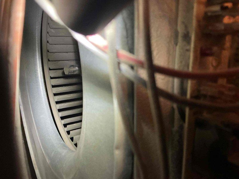 Performed comprehensive tune-up on 24-year-old furnace with focus on system safety and functionality. Diagnostic testing revealed a weak igniter, out-of-spec blower capacitor, and a potential hairline crack in the heat exchanger, though system remained operational. Documented issues with photographic evidence for customer's home warranty claim and discussed heat distribution concerns between floors.