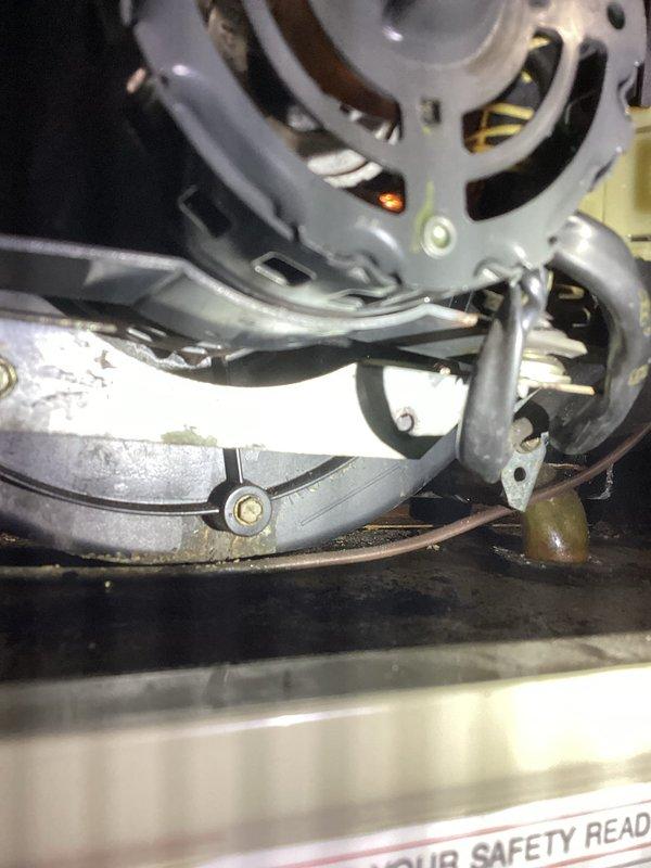 Responded to commercial no-heat call for older furnace making loud noises. Diagnosed broken inducer motor bracket causing motor wobble and preventing proper furnace startup. Inspected heat exchanger, noting significant rust deterioration. Also identified issues with adjacent furnace including plugged condensate drain and broken collector box. Customer approved repairs for both units but is considering replacement of both aging furnaces.