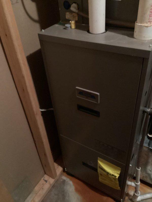 Performed routine maintenance inspection on natural gas furnace, AC unit, and gas fireplace. Discovered significant water damage to the furnace likely caused by AC unit leakage, with extensive rust on the heat exchanger and blower compartment. Noted inducer bearings showing signs of wear, though no compromised components were identified. Customer advised of findings and scheduled follow-up consultation to review equipment replacement options.