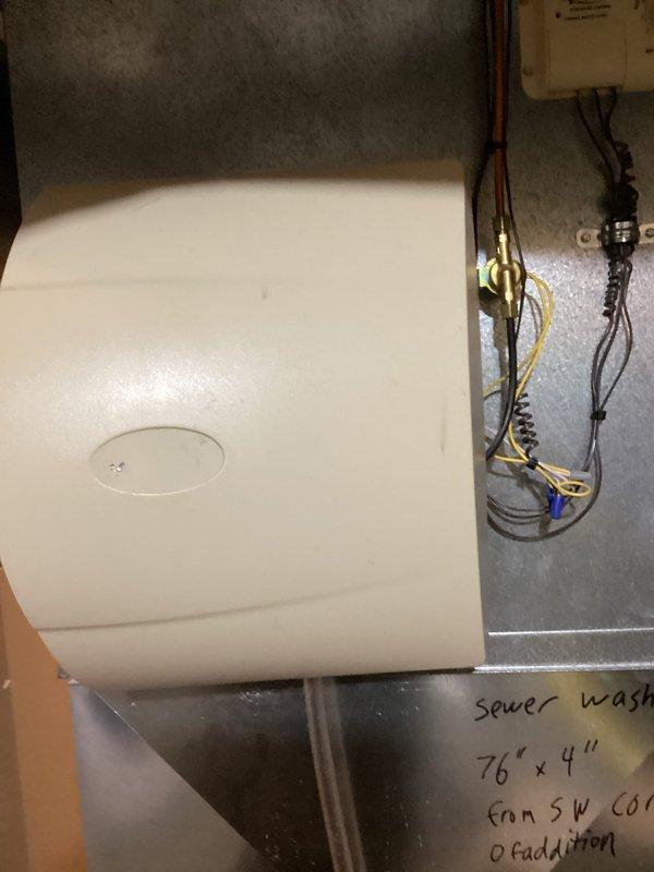 Responded to service call for garbage disposal leaking from bottom. Removed failed unit and installed new garbage disposal. Connected customer to rewards program. Inspected utility sink water supply issue during service.