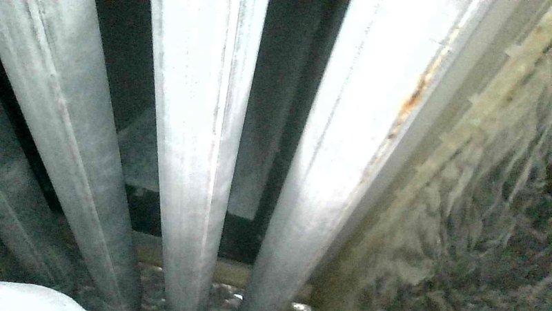 Responded to no heat complaint on 15-year-old furnace that was blowing cold air. Diagnosed failed inducer limit switch which had deteriorated to the point where it crumbled when accessed. Implemented temporary bypass of the failed component to restore heat function and ordered replacement part for upcoming follow-up service.