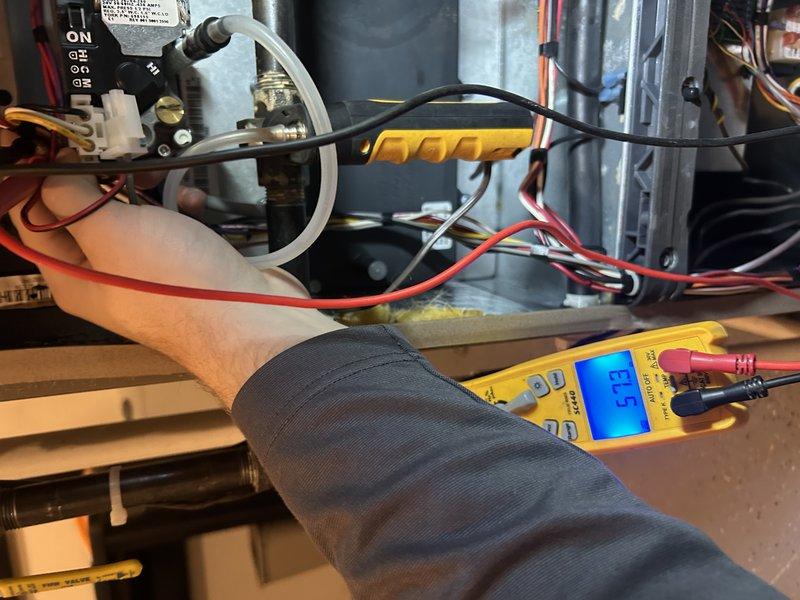 Completed scheduled furnace maintenance on a two-zone FRP system with four zone dampers. Performed comprehensive tune-up including testing operation, cleaning air filters, verifying gas pressure, inspecting routine components, and confirming proper drain flow. Conducted electrical testing with multimeter and inspected the air exchanger, noting customer recently replaced filters. Both upstairs and downstairs zones verified to be functioning correctly.