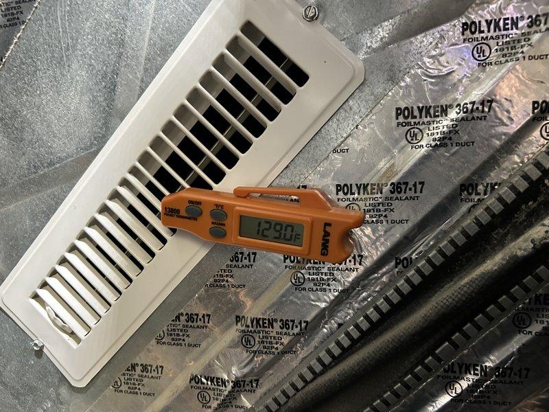 Responded to no-heat emergency call for recurring issue. Diagnosed furnace lockout due to open limit switch. Found filter heavily contaminated with mineral deposits from customer's ultrasonic humidifier, causing extreme plenum temperatures (180°F). Replaced filter and discovered inoperative built-in furnace humidifier. Traced problem to faulty solenoid, which was replaced and tested to confirm proper system operation. Advised customer to utilize the furnace-mounted humidifier instead of ultrasonic unit, or to use distilled water if continued use is necessary.