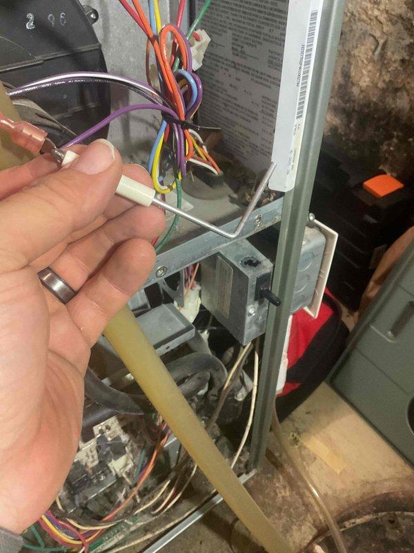 Responded to no heat call for 10+ year old FA furnace blowing cold air. Diagnosed issues with dirty flame sensor and filter. Serviced unit by cleaning flame sensor and replacing filter, which restored proper heating function.