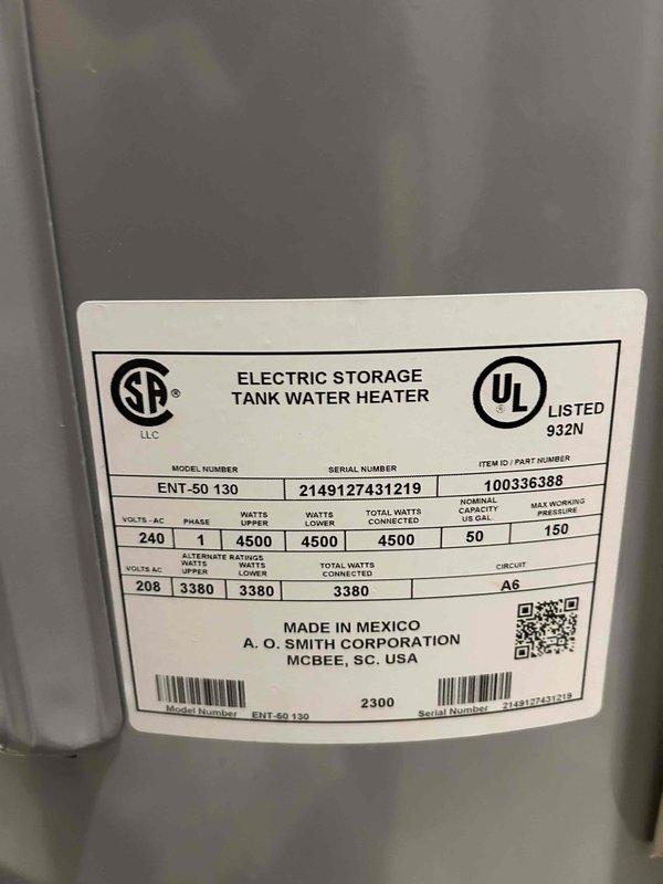 Adjusted temperature settings on 50-gallon A.O. Smith electric water heater (Model ENT-50130) that was delivering lukewarm water. Found top element set at lowest temperature while bottom element was at 120°F; corrected by setting both elements to consistent 120°F temperature to restore proper hot water function.